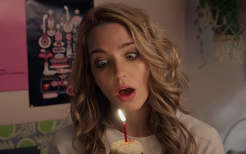 tree blowing out a candle in happy death day