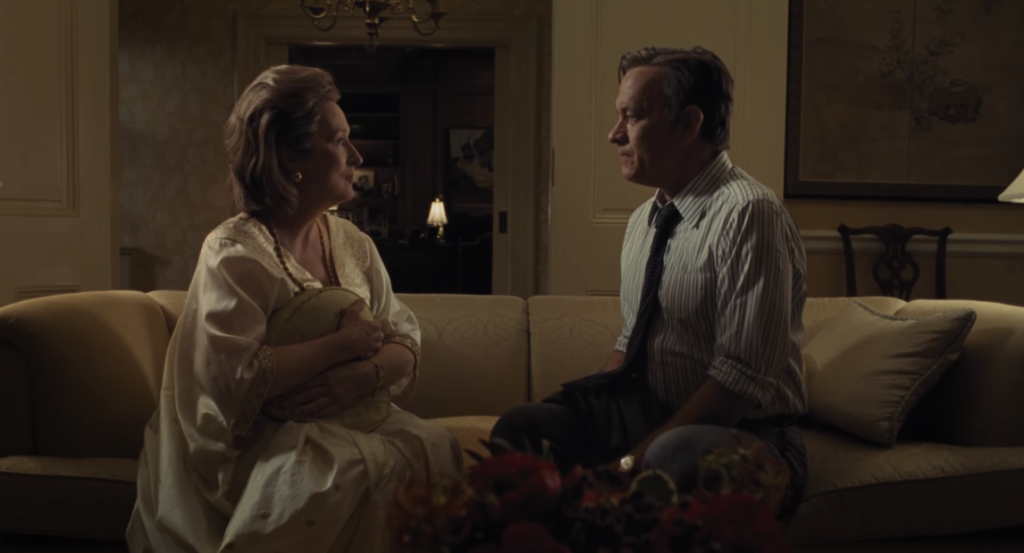 Katharine Graham (Streep) and Ben Bradlee (Hanks) discussing the Pentagon Papers from her sofa
